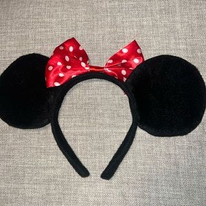 Classic Minnie Mouse ears with polka dot bow.